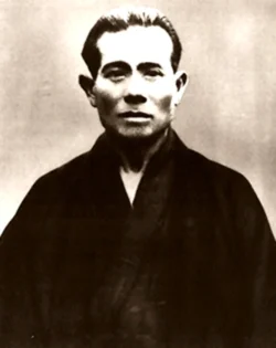 Kanbun Uechi (1877–1948) – Founder of Uechi-Ryu one of the primary karate styles of Okinawa and a fighting system associated with self-defence and heavily influenced by Chinese fighting systems. He trained in China for several years. His style emphasized quick, powerful strikes inspired by animal movements. Kanbun Uechi (1877–1948)